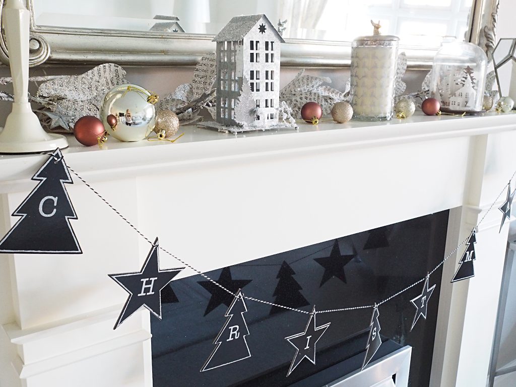 A fireplace decorated for Christmas