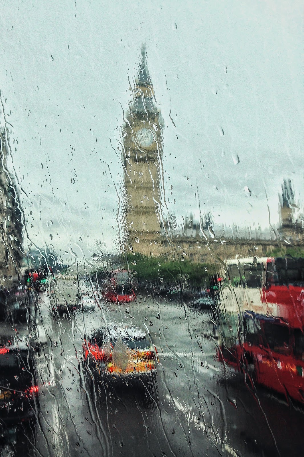 A view through a rainy window of big ben in London