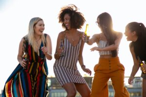 A group of women are celebrating Galentine's Day at a party.