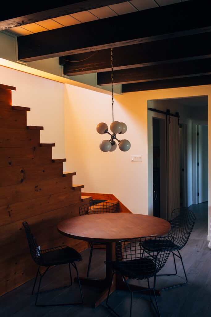 A reliable dining room with a table and chairs.