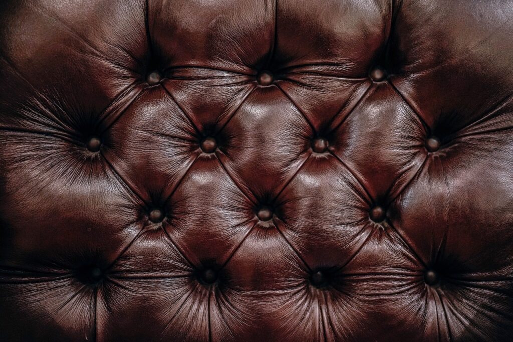 A close up of a re-dyed leather chair.