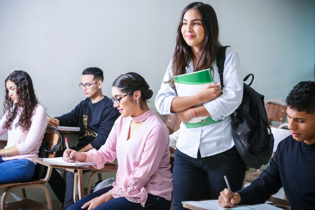 A group of smart students in a classroom.